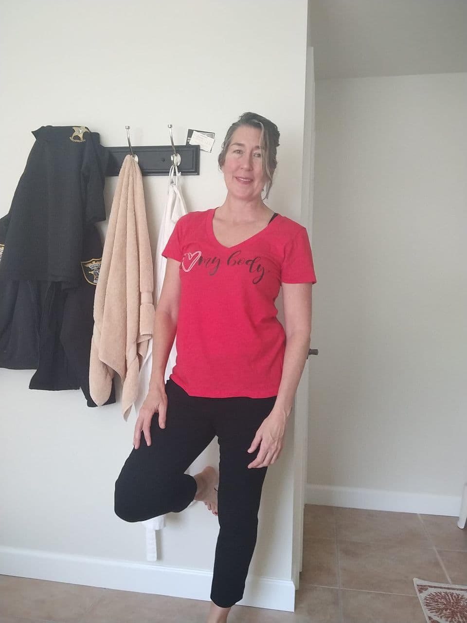 A woman wearing her I Love My Body shirt