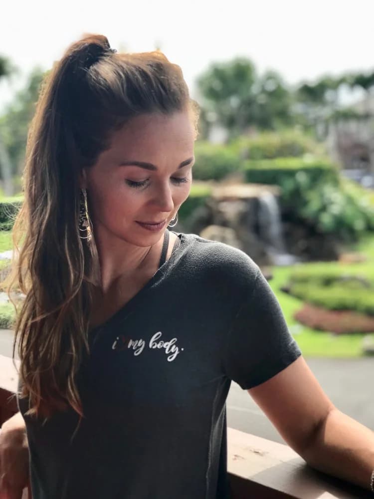 A woman wearing her I Love My Body shirt