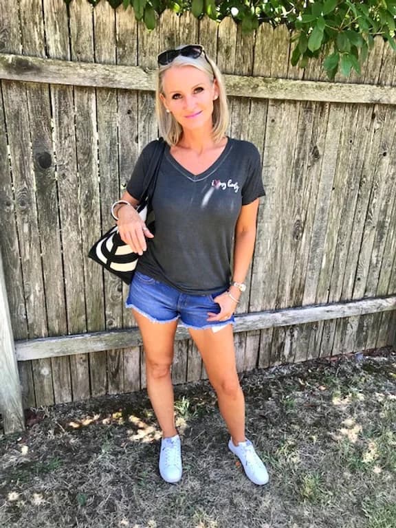 A woman wearing her I Love My Body shirt