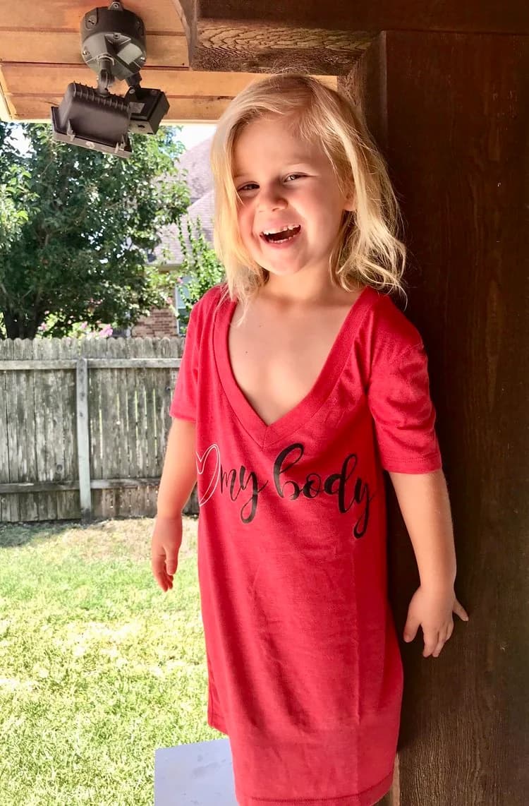 Linda's daughter wearing an I Love My Body shirt