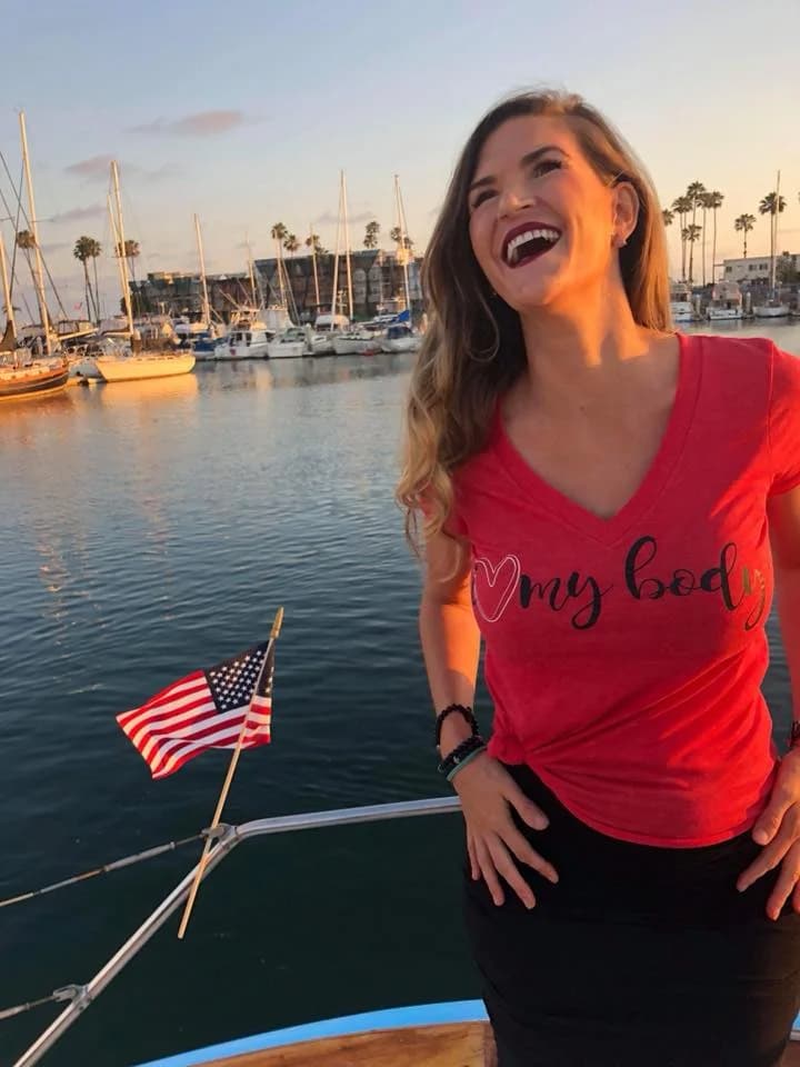A woman wearing her I Love My Body shirt