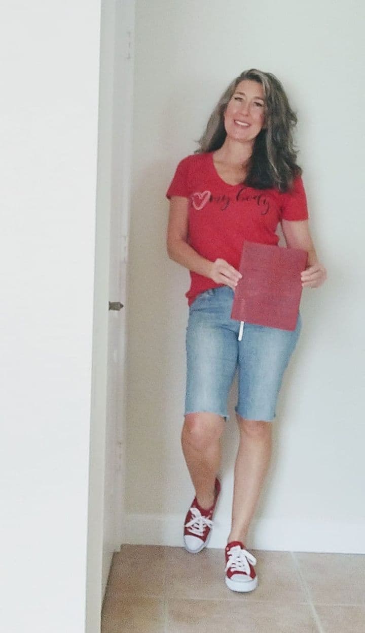 A woman wearing her I Love My Body shirt