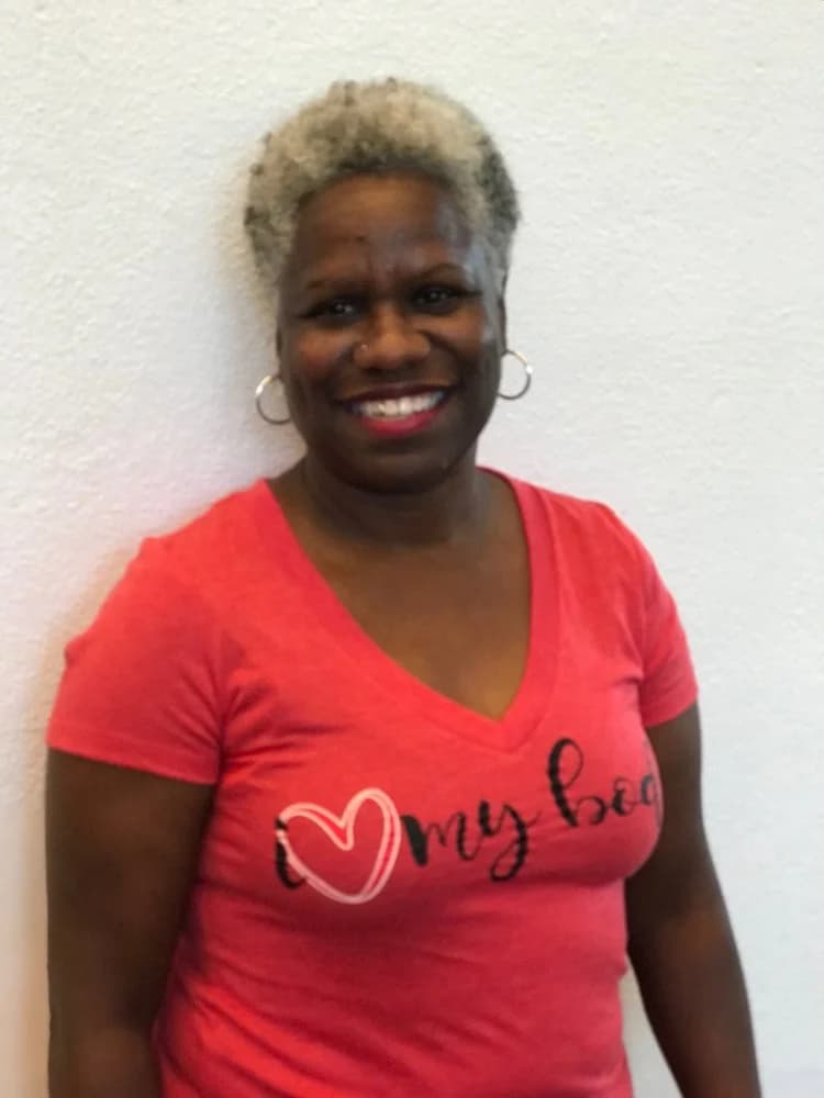 A woman wearing her I Love My Body shirt
