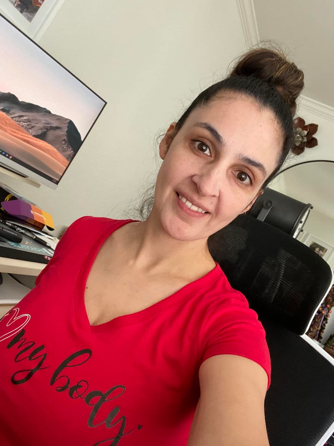 A woman wearing her I Love My Body shirt