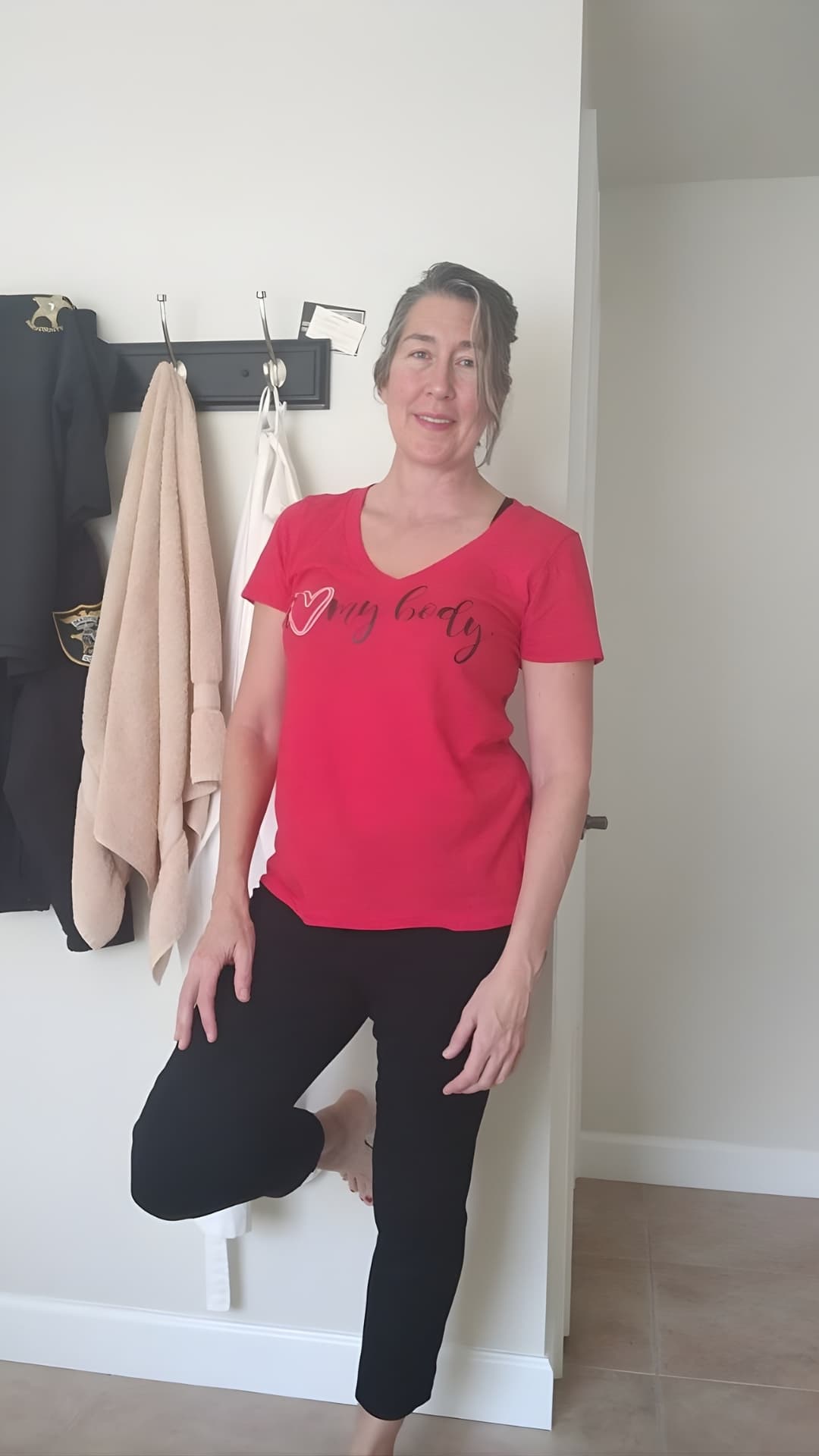 A woman wearing her I Love My Body shirt