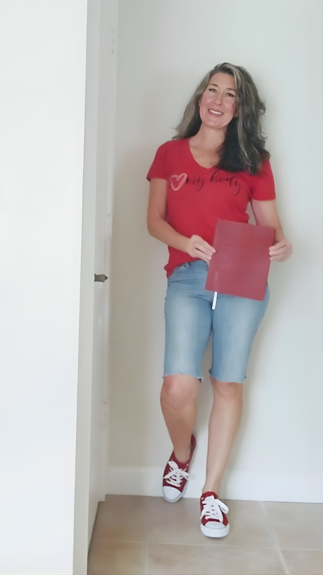 A woman wearing her I Love My Body shirt