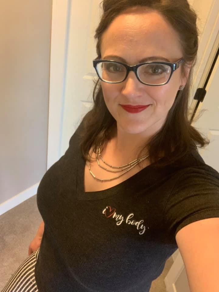 Melinda wearing her I Love My Body shirt