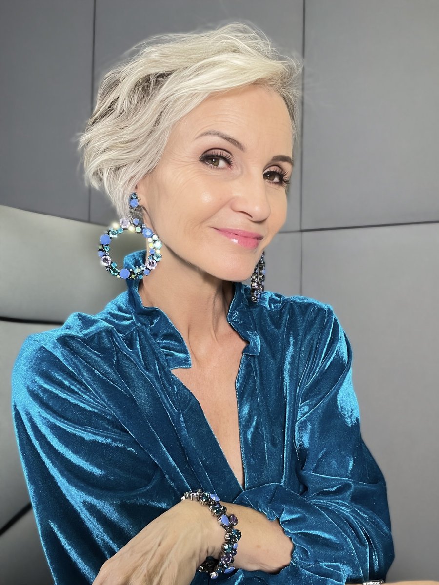 Linda Paige portrait in a teal velvet blouse