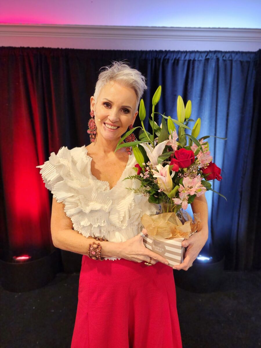 Linda Paige with flowers at the close of LP Live 2024